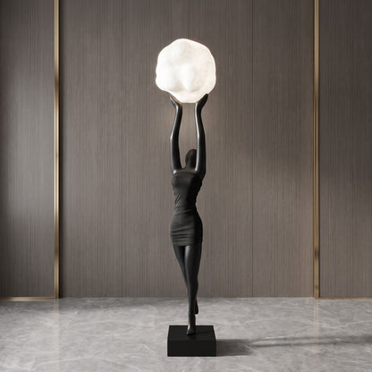 Creative resin figurine of a woman holding a cloud-like lamp, perfect for modern home decor